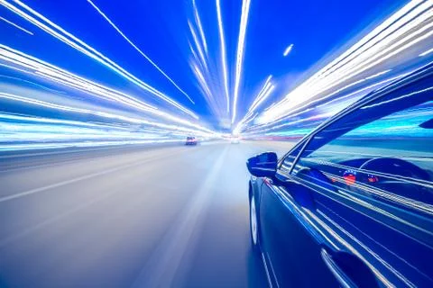 View from Side of Car moving in a night city Stock Photos