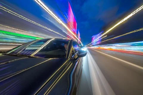 View from Side of Car moving in a night city Foto stock