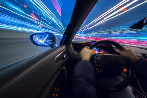 View from Side of Car moving in a night city Stock Photos