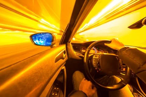 View from Side of Car moving in a night city Stock Photos