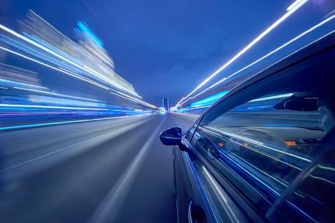 View from Side of Car moving in a night city Stock Photos