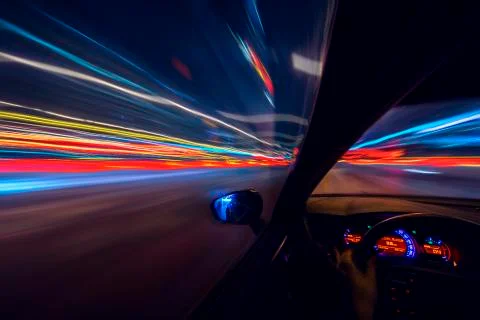 View from Side of Car moving in a night city Stock Photos