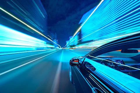View from Side of Car moving in a night city Stock Photos