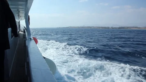 View from side deck of moving luxury yacht 動画素材 70790417