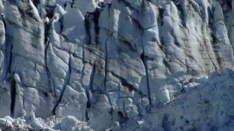 View of the side of a glacier and snow covered mountain in Glacier Bay, Alaska. Stock Footage 52216223