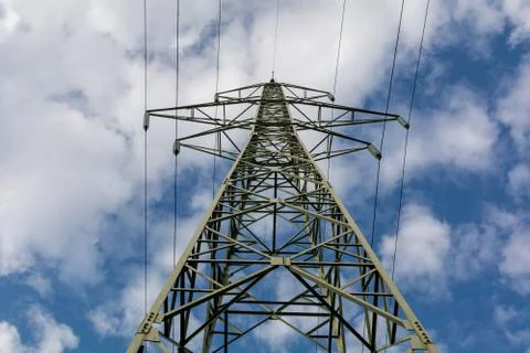 View side of high voltage pole in blue sky Stock Photos