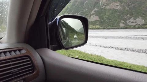 View of the side mirror and the mountain river Video stock 300198328
