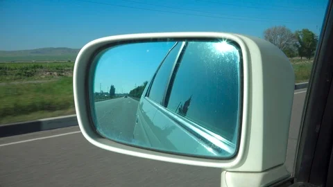 View in the side mirror of the car Stock-Footage 107688065