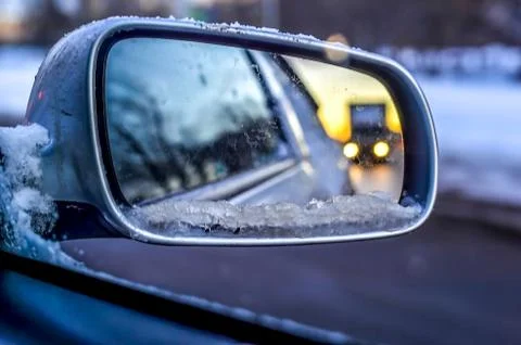 View in the side mirror of the car Stock Photos