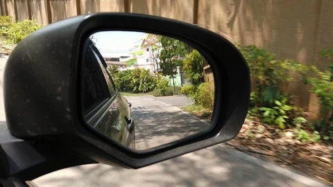 View of side mirror, driving passes along the road. Stock Footage 108607278