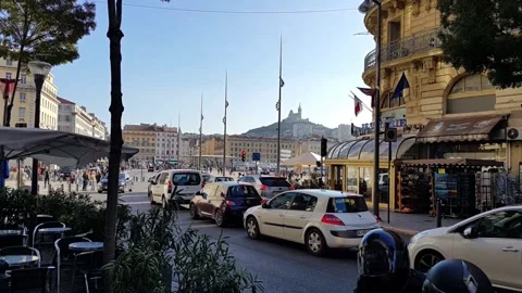 View from the side of Republic street to Notre Dame de la Garde in Marseille. Stock Footage 145537257