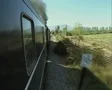 View from side train window facing front of train SD Footage