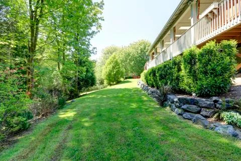 View of side yard landscape Stock Photos