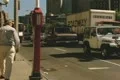 View from sidewalk of passing cars Footage