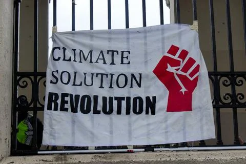 A view of sign " Climate Solution Revolution" during The Climate Strike Stock Photos