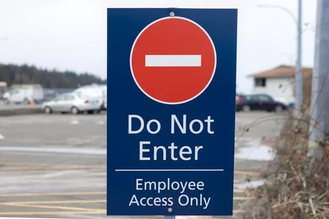 View of Sign Do Not Enter Employee Access Only on a Parking Lot Stock Photos