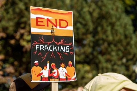 View of sign END FRACKING  as part of Global Climate Strike in front of Van.. Stock Photos