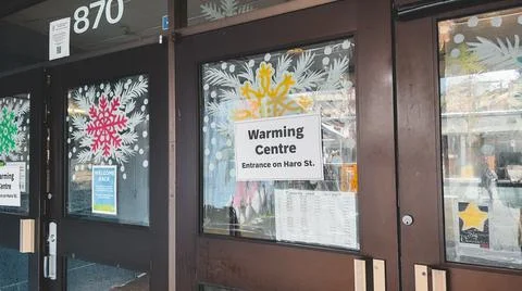 View of sign Extreme cold Warming Centre at the entrance of Denman Community Stock Photos
