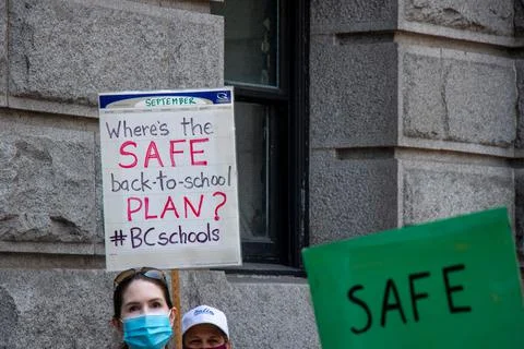 View of sign Safe back to school plan taken during Vancouver rally Stock Photos