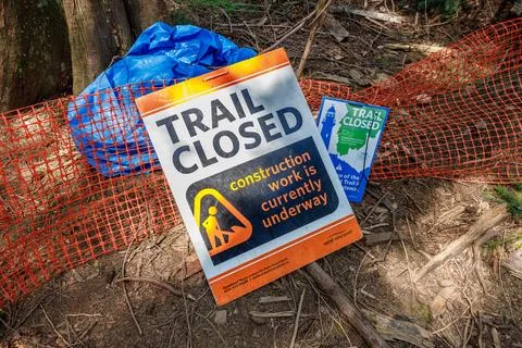 View of sign Trail Closed inside Lighthouse Park in West Vancouver Stock Photos