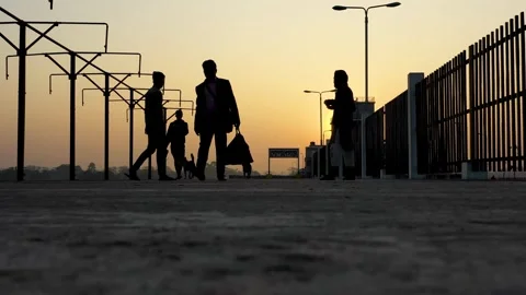 View of silhouettes of people walking at sunset, Bangladesh. Stock-Footage 334960969