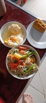 View of simple dish and side dishes on the table Stock Photos