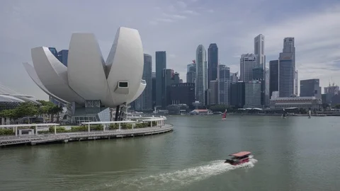 View of Singapore's skyline and museum of art over marina bay Timelapse Stock Footage