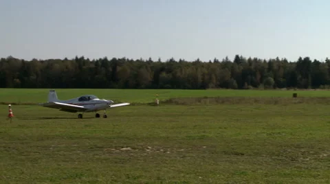 View of single airplane rides down the runway Stock Footage 57651851