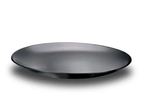 View of single empty black ceramic plate. Stock Photos