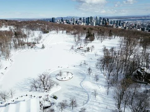 View of the skating rink and downtown in winter from Mont Royal, Montreal. Stock Photos