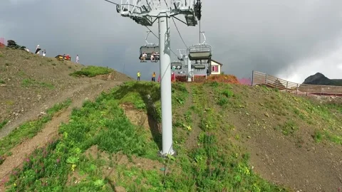 View from the ski lift in the mountains. Cable car ride. Beautiful landscape Stock Footage 165463154