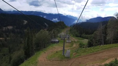 View from the ski lift in the mountains. Cable car ride. Beautiful landscape Stock Footage 167382641