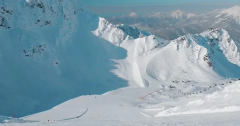 View on the ski resort from the top of the ski slope in a sunny day Stock Footage 147117002