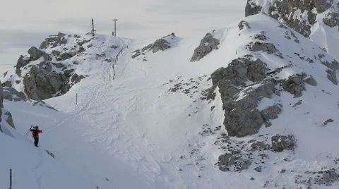 View of a skier walking on a path on the mountain, Innsbruck Stock Footage 61408585