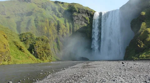 View of the Skogafoss waterfall and the river, Iceland Stock Footage 33747379