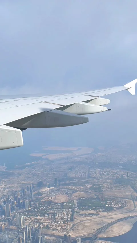 A view of the sky and clouds from an airplane window. Video stock 231474048