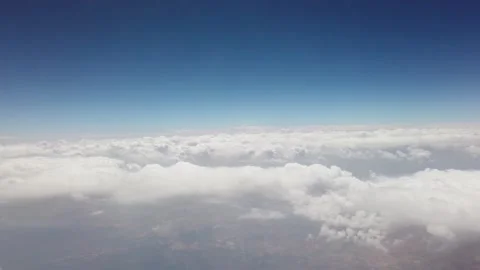 A view of the sky and clouds through the airplane window Stock Footage 207118279
