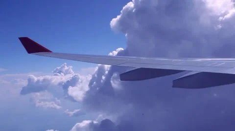 View on sky and clouds. Wing of airplane from window. HD. 1920x1080 Stock Footage 46853779