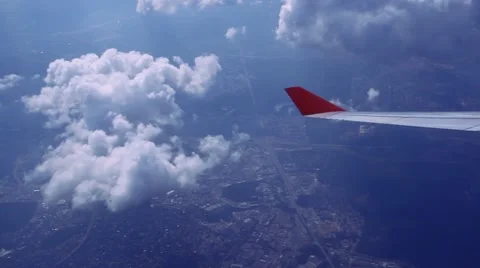 View on sky and clouds. Wing of airplane from window. HD. 1920x1080 Stock Footage 46853796
