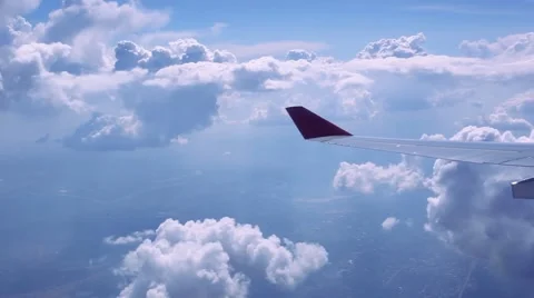 View on sky and clouds. Wing of airplane from window. HD. 1920x1080 Stock Footage 46853801