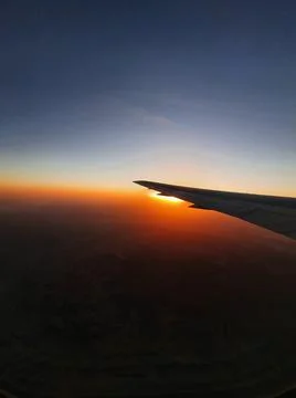 View of the sky and the wing with the iluminator of the aircraft Stock Photos