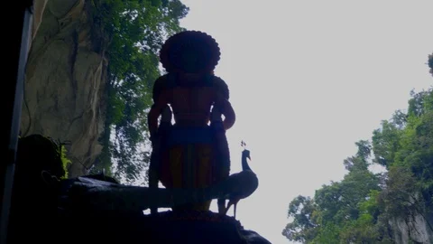 View  of the sky from batu cave with green mountain Stock Footage 111278749