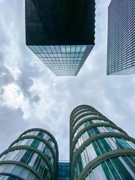 A view of the sky between high-rise buildings. Stock Photos