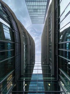 A view of the sky between high-rise buildings. Stock Photos