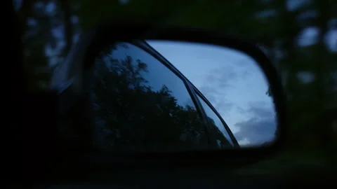 View at the sky from car mirror Stock Footage 285081817