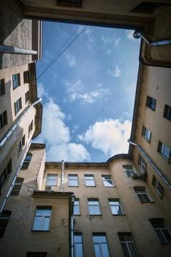 View of the sky from a closed courtyard Stock Photos