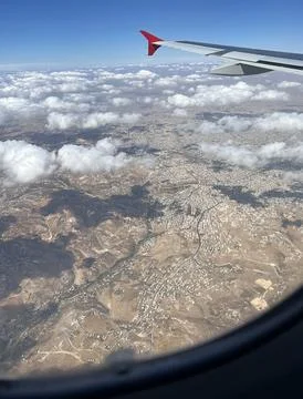 View of the sky from a flying plane Stock Photos