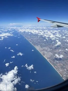 View of the sky from a flying plane Stock Photos