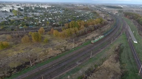 View from the sky on a freight train carrying coal, drone flying over the 스톡 동영상 68775976