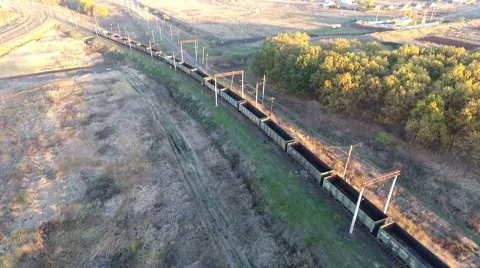 View from the sky on a freight train loaded with coal, unmanned flight over the 스톡 동영상 68727419
